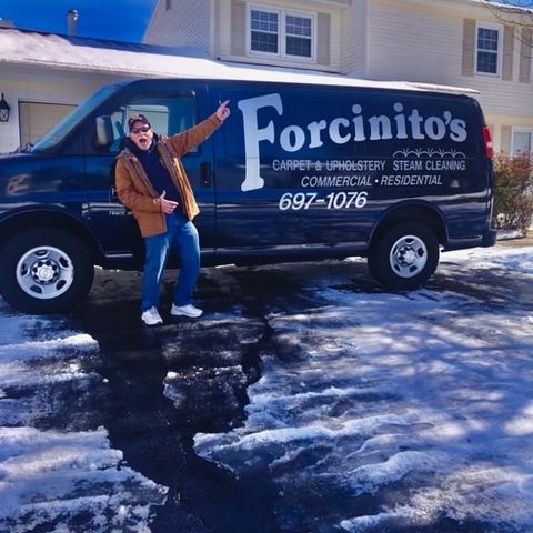Pete pointing to the Forcinito’s name on the side of the van